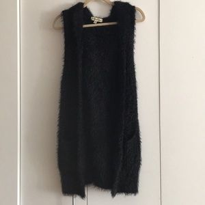 Black faux fur vest with hood